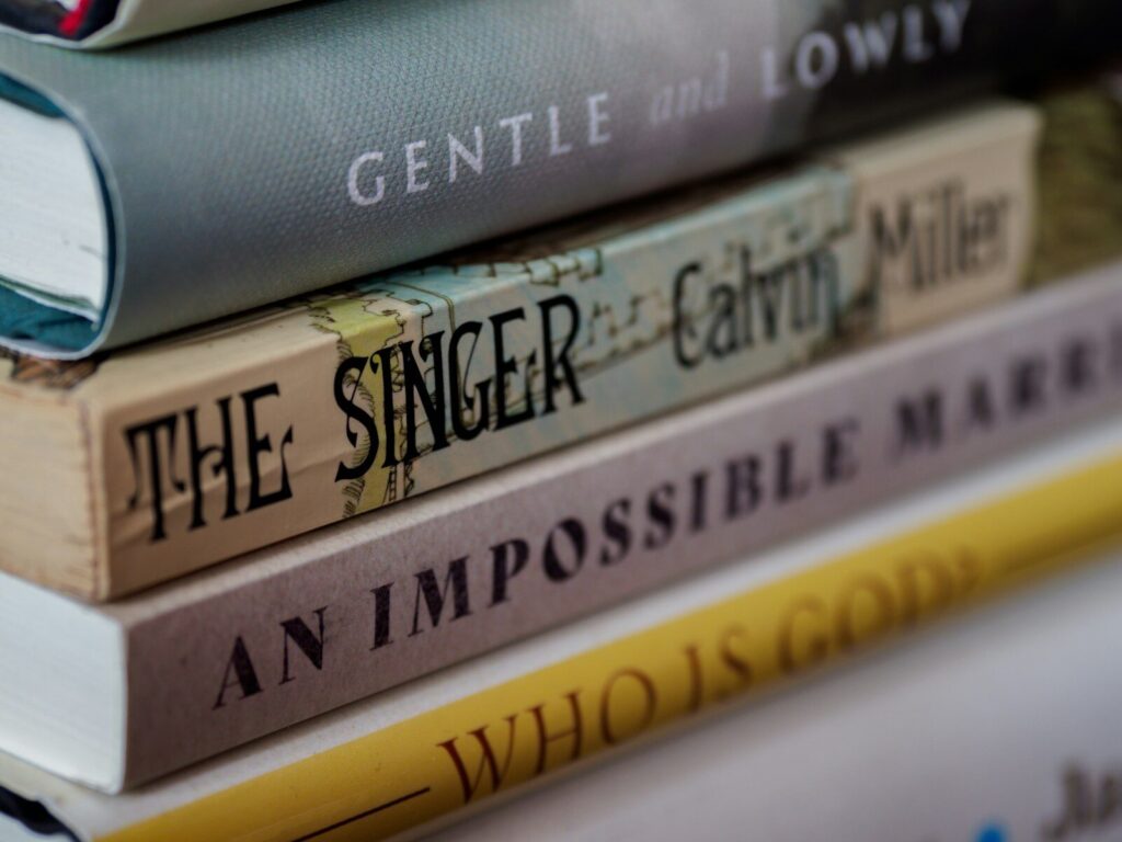 a stack of books sitting on top of each other